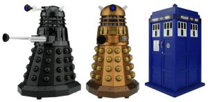 Image of 3 styles of Doctor Who Bluetooth Speakers: black Dalek Sec, the impressively bronzed Assault Dalek, and the famous blue box herself, the lovely TARDIS