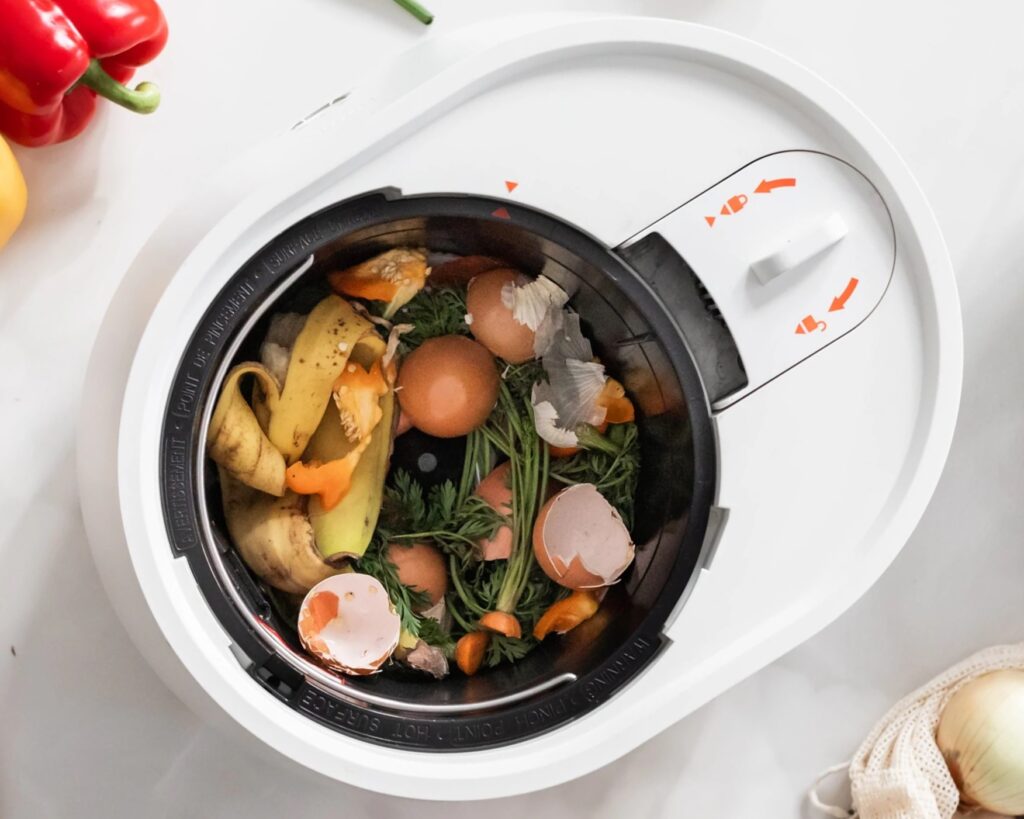 Top down view inside the Lomi composter with food scraps.