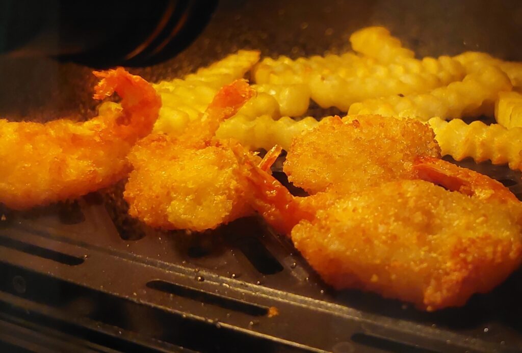 Fried Shrimp and Fries cooking inside ChefMaker