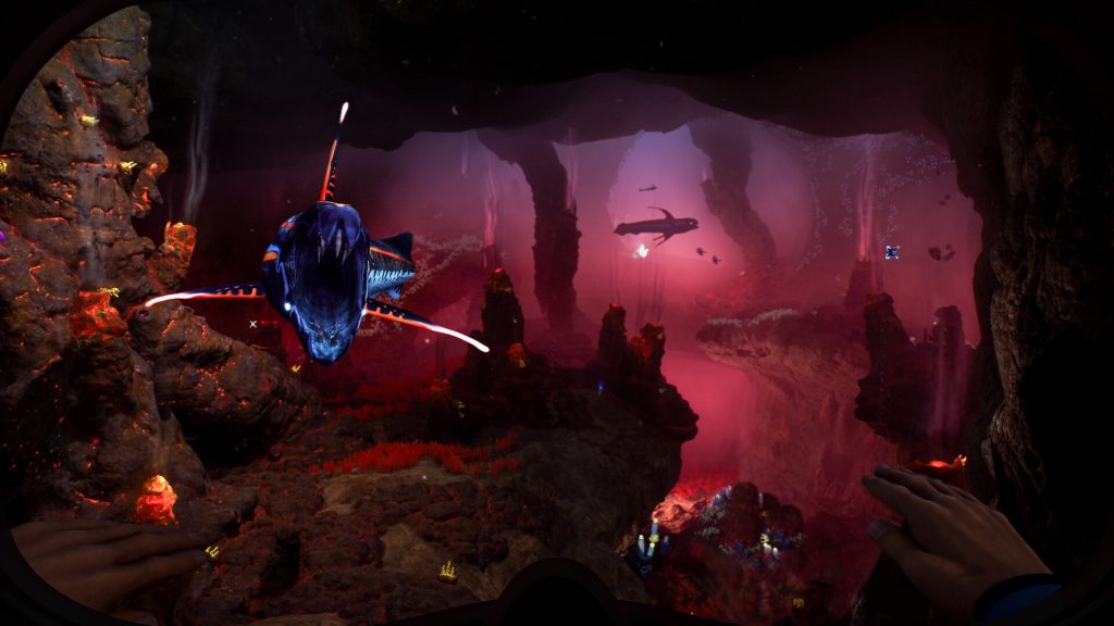 Subnautica 2 screenshot of dangerous alien fish swimming inside a deep sea lava-filled cavern.