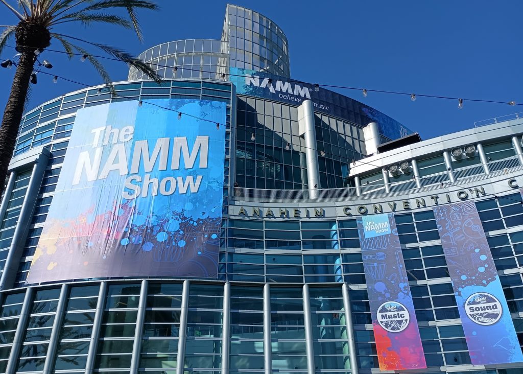 The NAMM Show 2025 banner on the outside of the Anaheim Convention Center.